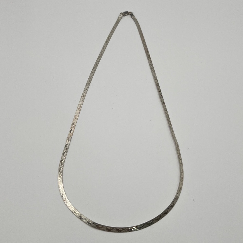 Silver Herringbone Necklace with Dolphin Design